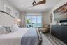 Primary Bedroom with balcony overlooking Tampa Bay and Skyway Bridge