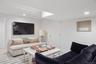 Living area featuring recessed lighting and baseboards
