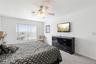 First Floor Bedroom with views of the Pool and the Tower Lake