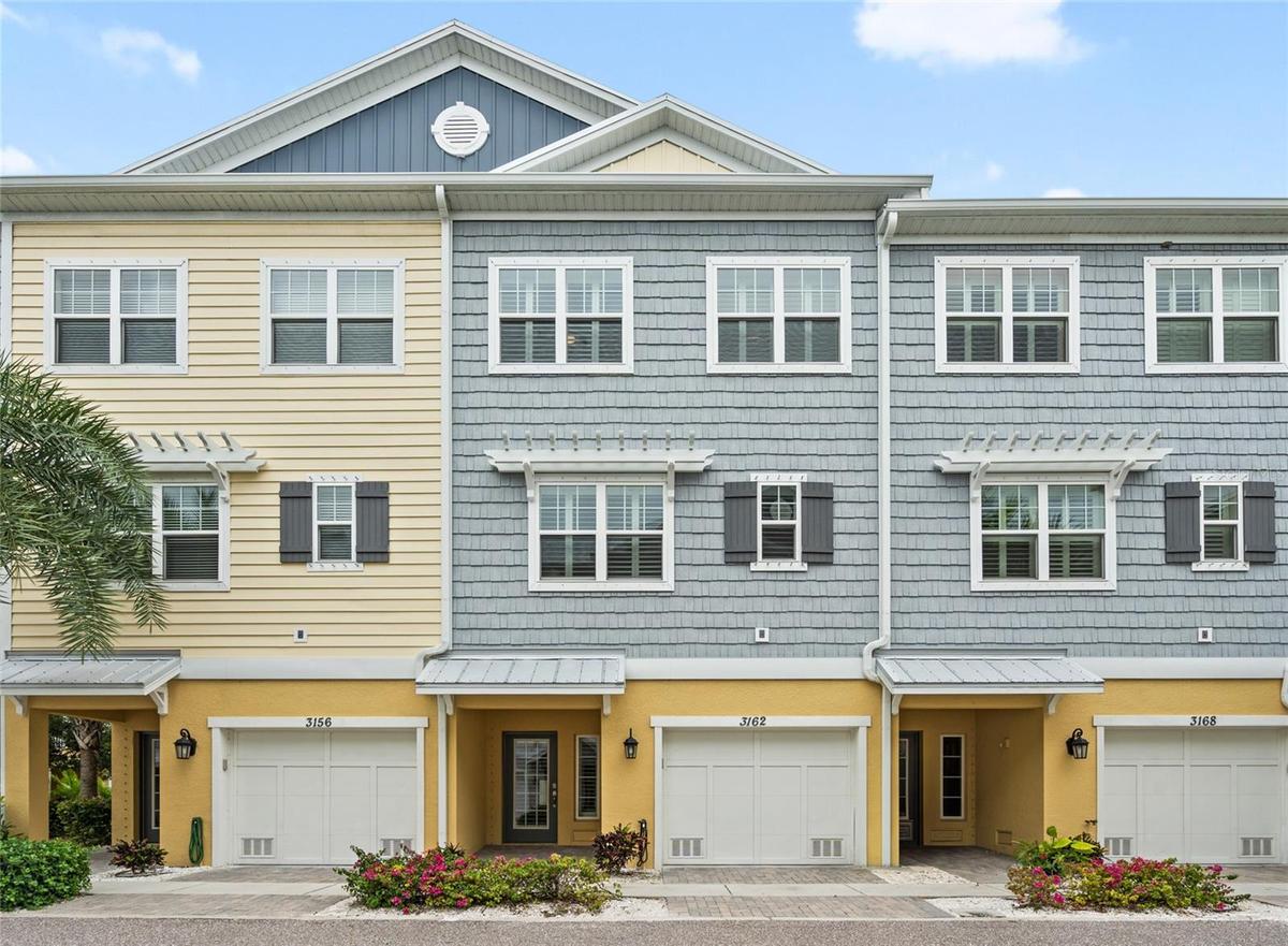 Coastal townhome with elevated design and private garage