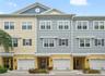 Coastal townhome with elevated design and private garage