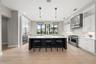 The heart of the home is the chef’s kitchen, thoughtfully designed for entertaining and everyday enjoyment.