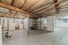 Basement with separate washer and dryer and electric panel