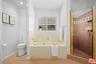 Primary bath w/ shower + tub