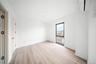Empty room with light wood-type flooring and baseboards