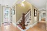 Stairs to Game Room/Theatre next to Side Entry door