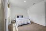 bedroom in-suite with walk-in closet