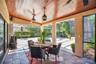 The patio off of the great room is covered for comfort