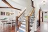 Open concept living with great flow from one living space to another. Rich hardwood floors and neutral walls.
