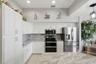 Kitchen with an oversized quartz island