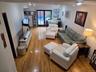 Living room with access to the deck.