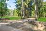 View of property's community featuring a lawn