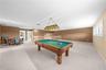 Large loft complete with pool table.