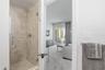 Walk-in shower in ensuite bath for bedroom #3.