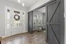 Bonus Room off entry complete with Barn Doors for privacy