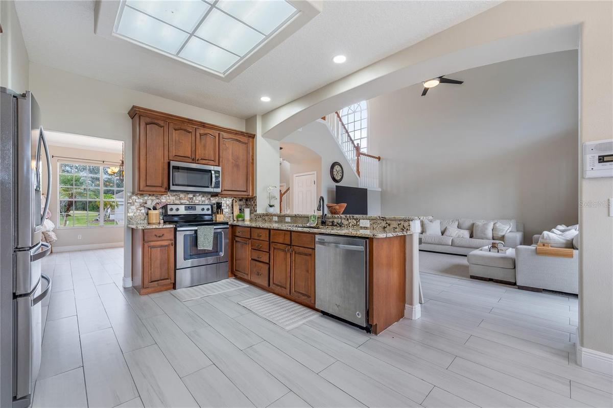Functional kitchen layout offering room to cook, gather, and entertain.