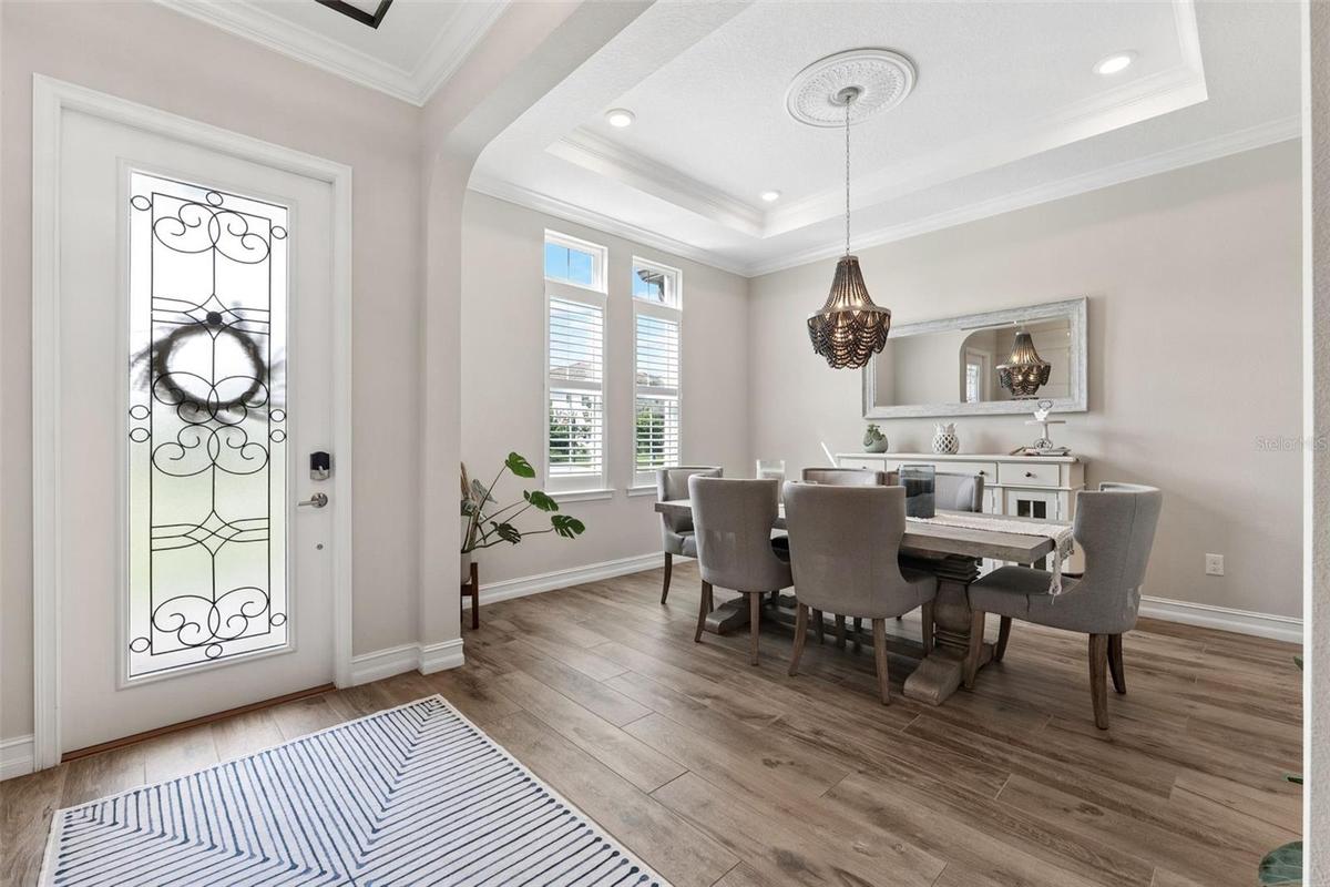 Welcoming formal dining room with warm colors and pride of ownership.