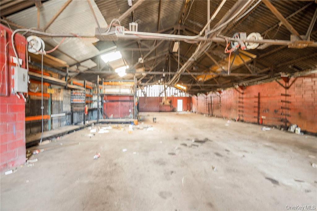 Garage with metal wall and electric panel