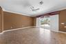 Family room opens up to lanai and pool area.