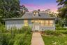 Updated Cap Cod with deeds lake rights to Oscawana Lake. Light blue horizontal siding facade with white trim