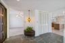 This home still has vibes of the 1960's...retro decor mixed with Mid Century Modern would make this home a standout!