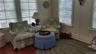 Open concept den right off the kitchen... relax with a drink, watch TV, or just listen to what's going...