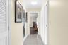 Hallway to Primary BR and Laundry