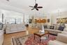 THE OPEN SPACE IS IDEAL FOR ENTERTAINING THE WOOD FLOOR IN THIS AREA HAS BEEN REFINISHED