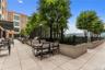 View of patio featuring outdoor dining area and area for grilling