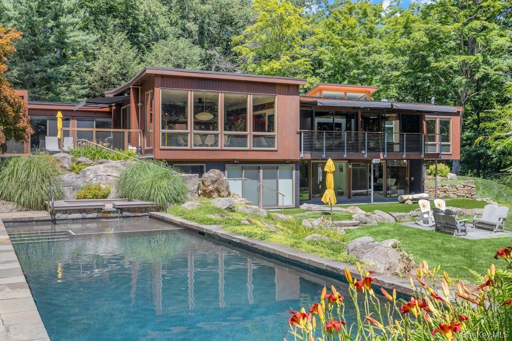 Magnificent MCM turn- key home offered fully furnished!