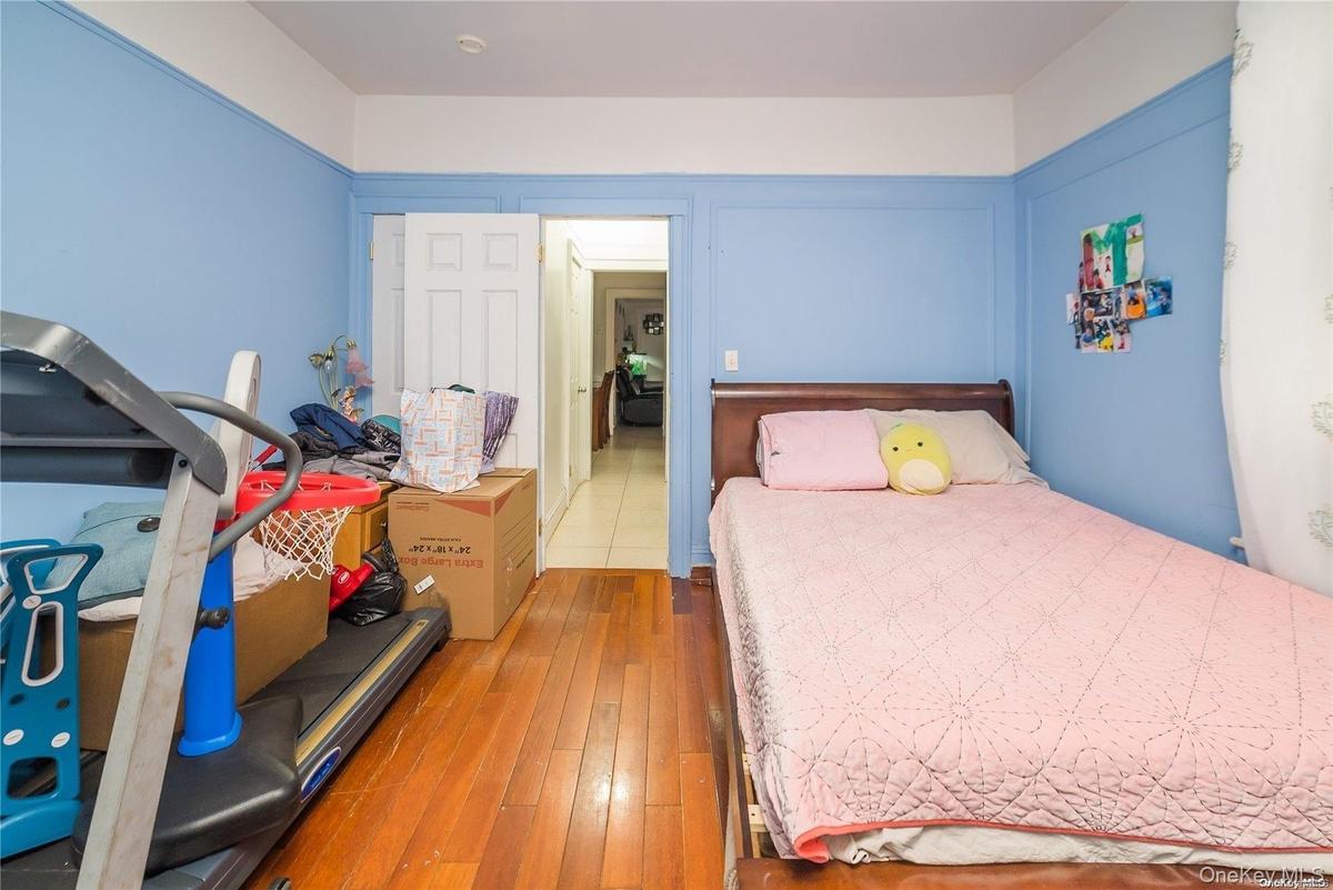 Bedroom featuring hardwood / wood-style floors