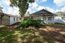 Expansive fenced-in .26-acre backyard offering rare privacy and endless possibilities