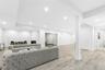 Living area featuring light wood-style floors and recessed lighting