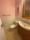 Bathroom featuring vanity and wainscoting