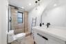 Sleek and modern, this newly renovated bathroom has it all