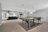 Playroom with carpet floors, baseboards, and recessed lighting