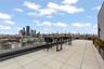 View of patio featuring a skyline view