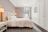 Expansive built-in custom cabinetry with recessed lighting and drawer storage