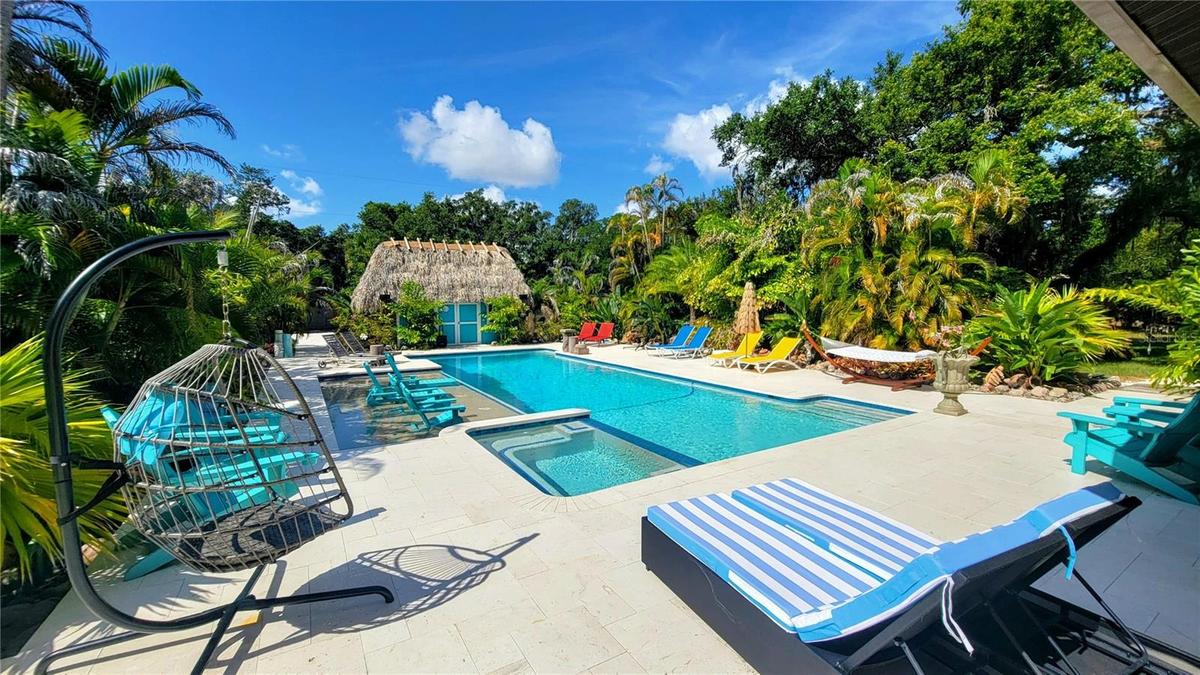 50X12 AND 12' DEEP HEATED POOL AND SPA