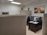 Large open room with cubicles