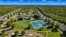 Community tennis/pickle ball court, bocce court and recreation area.