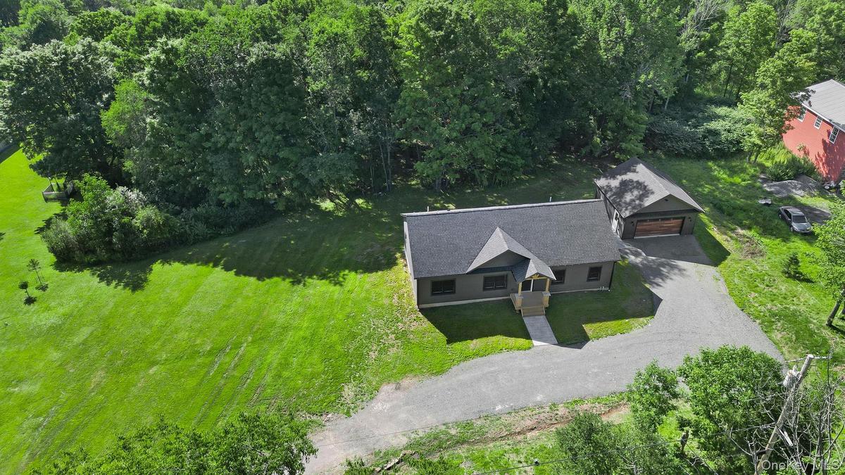 Property extends into treeline.