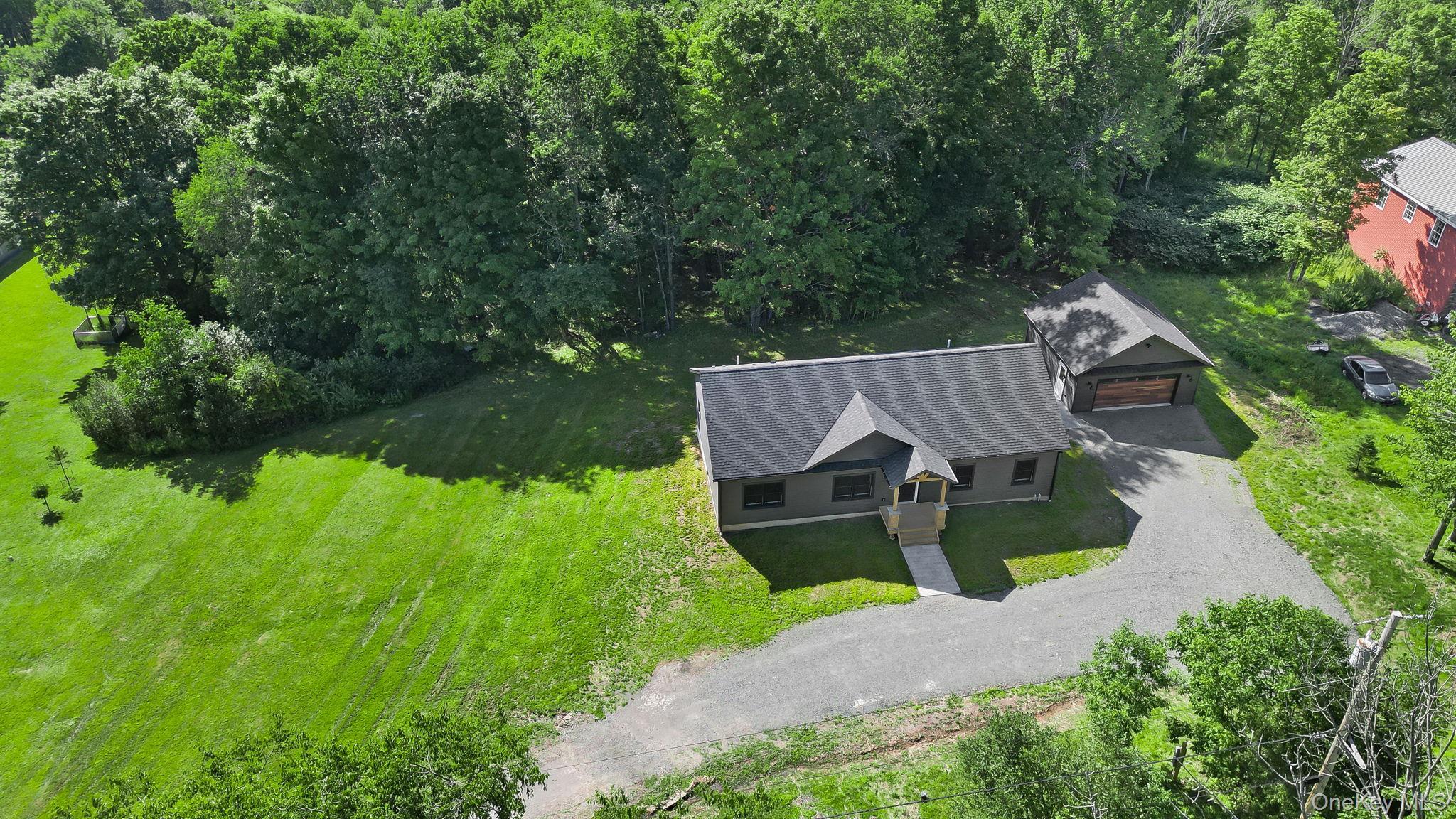 Property extends into treeline.