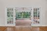French Doors off of Living Room to Screened Back Porch