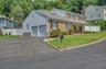 Two Car Garage and Additional  Driveway Parking Space