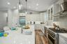 Kitchen and breakfast bar