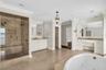 Primary suite with private balcony, huge en suite bathroom and walk-in closet