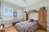 3rd level guest room with plantation shutters.