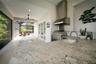 Outdoor kitchen with rear courtyard in the distance