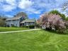 2 Pine Tree Drive in the spring